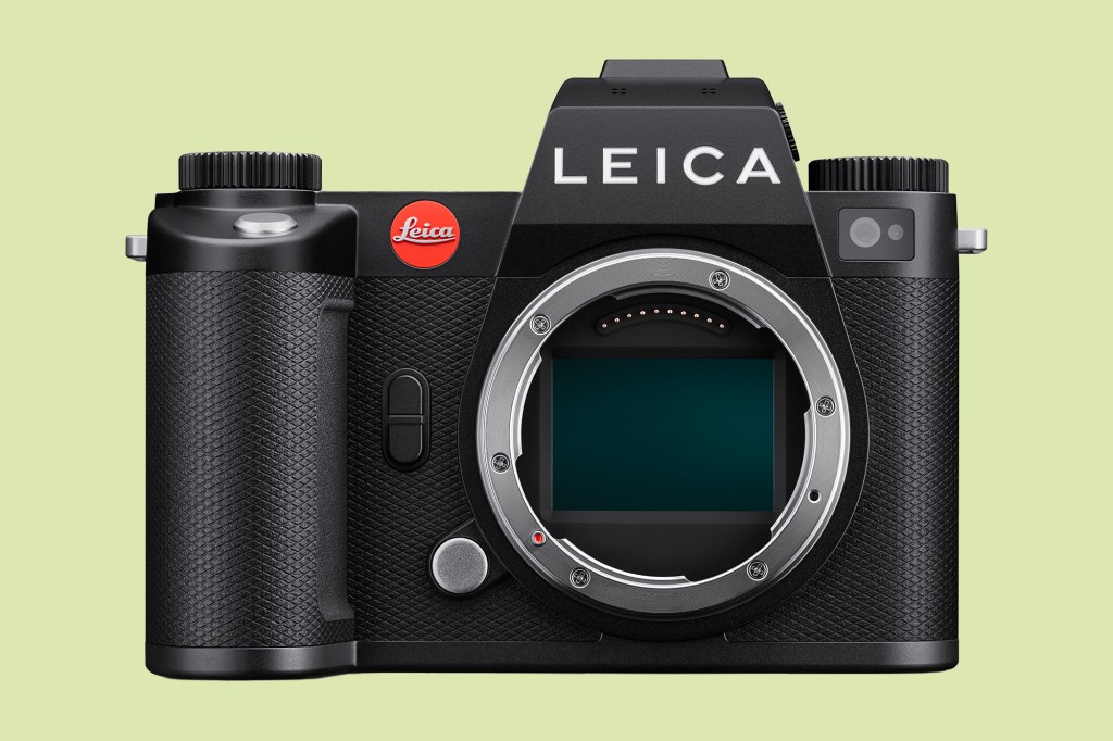 A black Leica camera with a silver circle on the screen